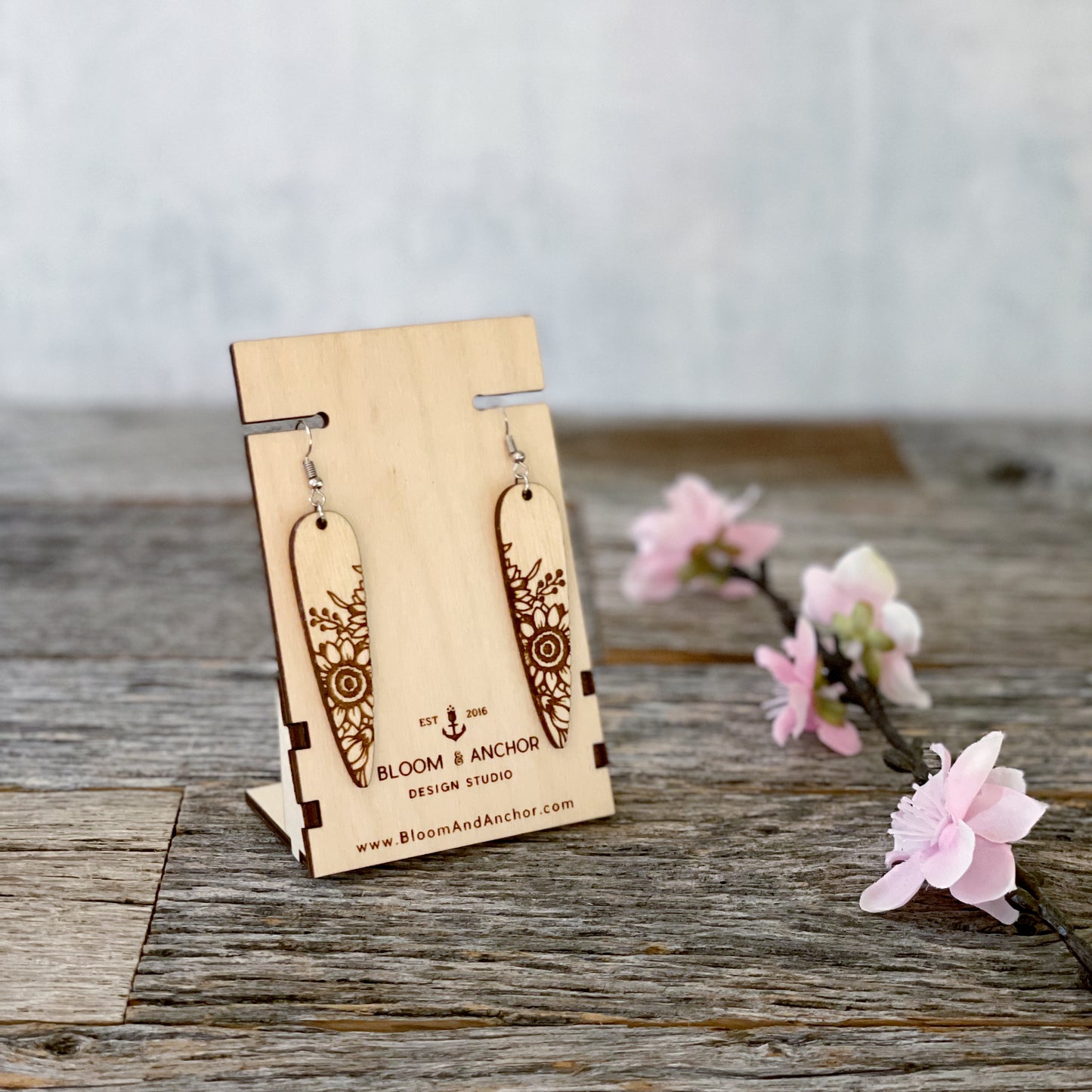 Laser cut and engraved wood sunflower earrings