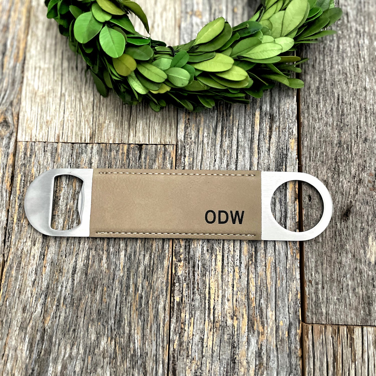 Laser engraved leather bottle opener