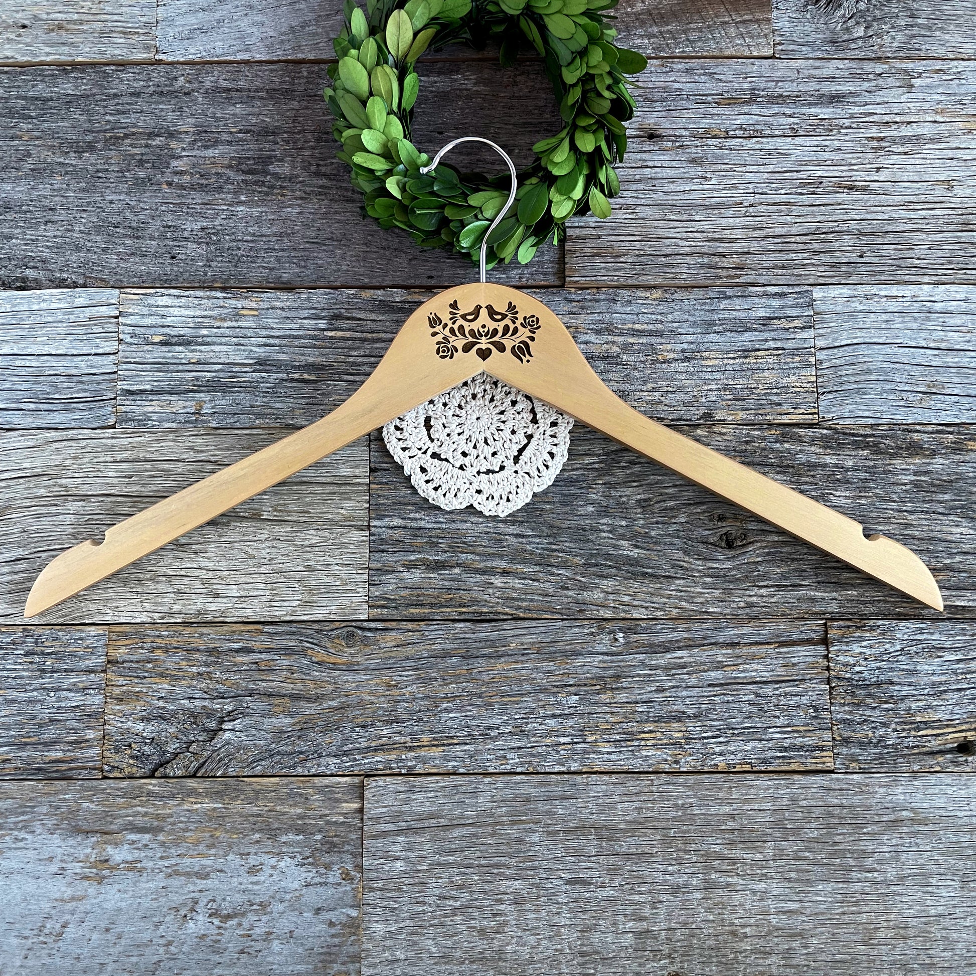 Laser engraved clothes hanger with lovely Hungarian folk motif