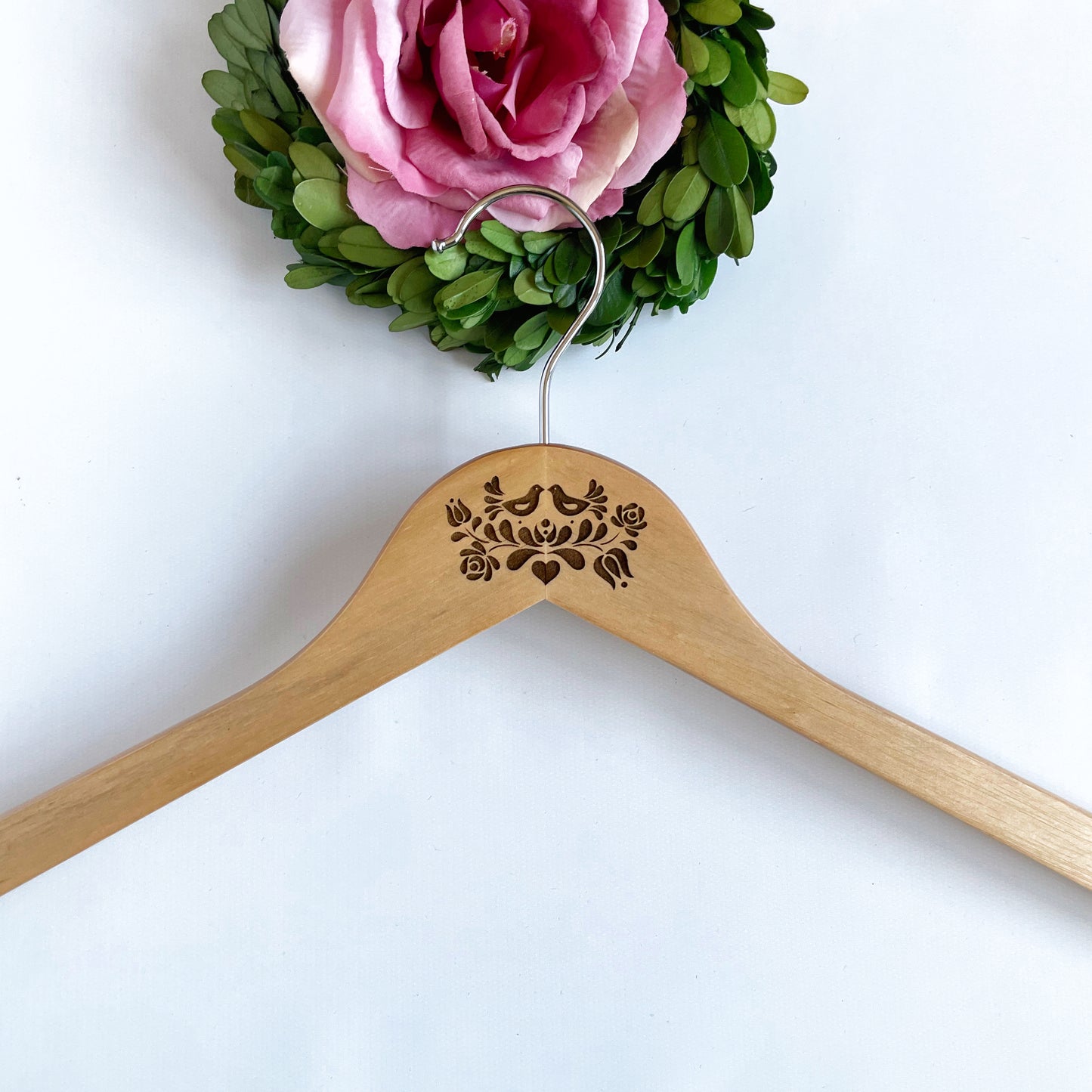 Laser engraved clothes hanger with lovely Hungarian folk motif