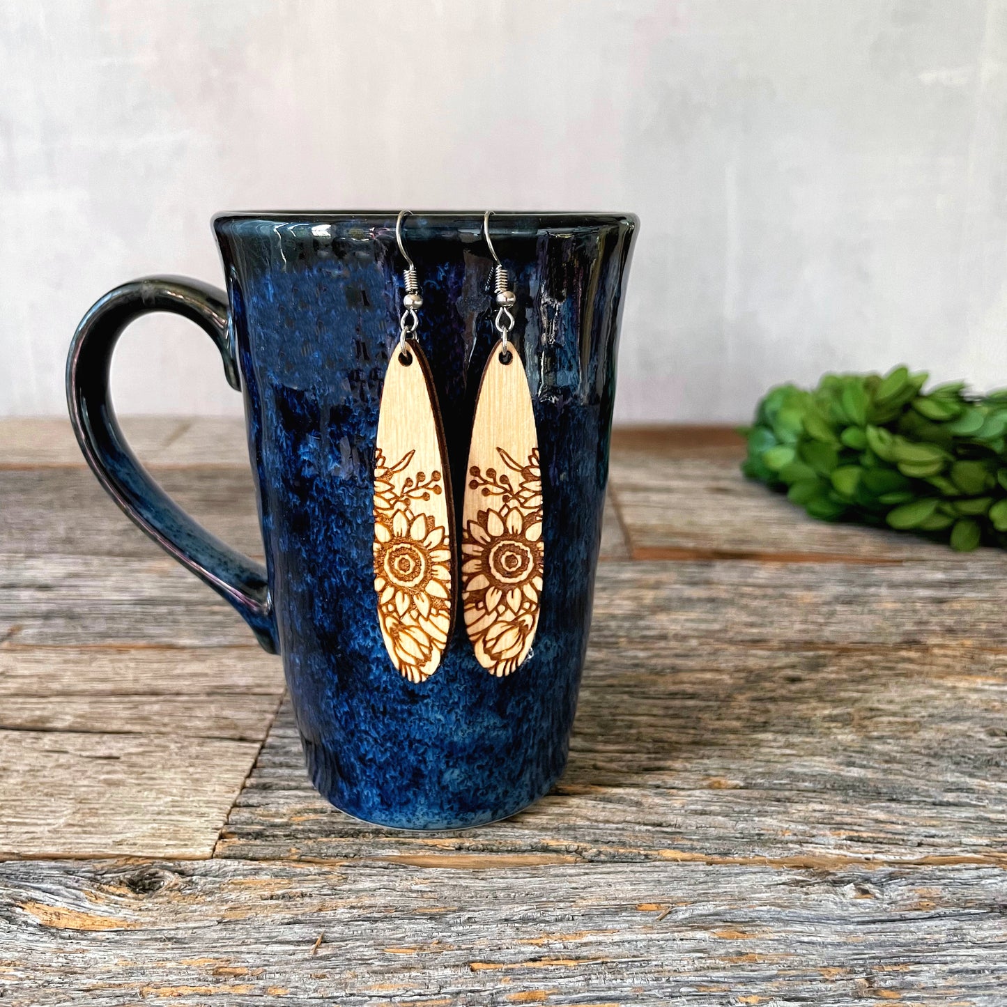 Laser cut and engraved wood sunflower earrings