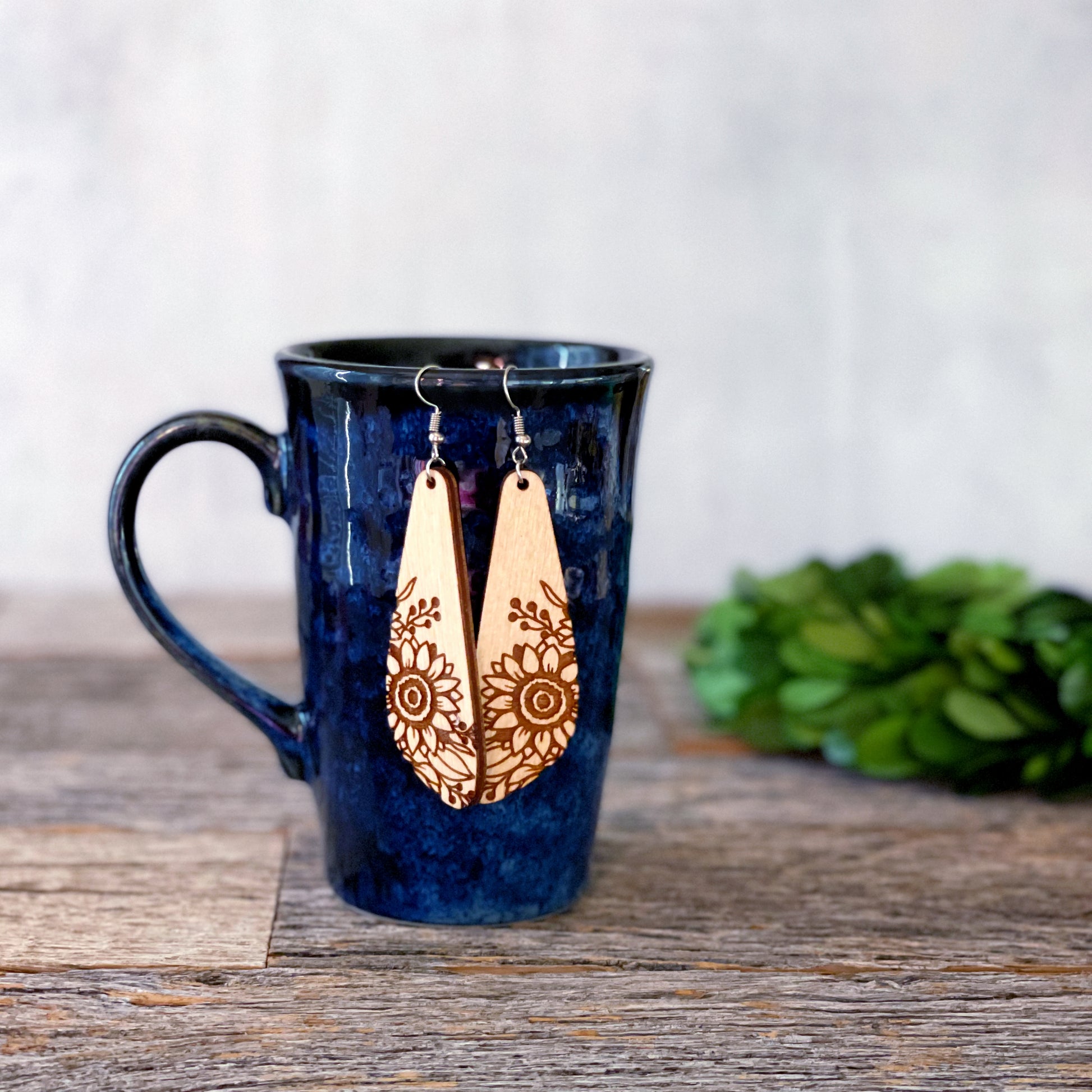 Laser cut and engraved wood sunflower earrings